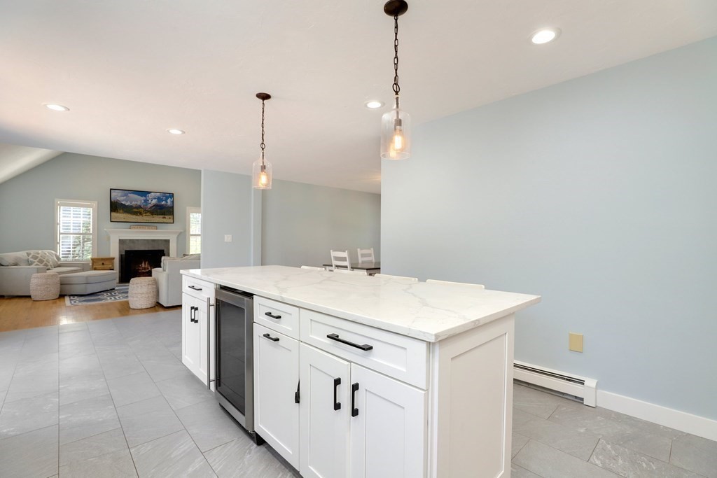 16 Oakbluff Road Sagamore Beach, MA 02562 - Photo 4 of 34 a kitchen that has a lot of cabinets in it