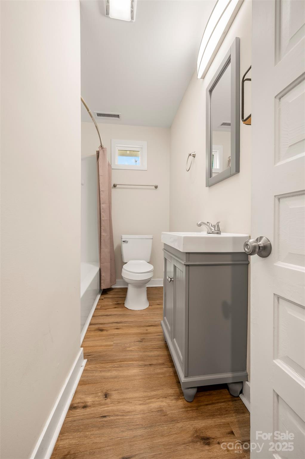 512 Spindale Street Spindale, NC 28160 - Photo 15 of 25 a bathroom with a sink and a toilet