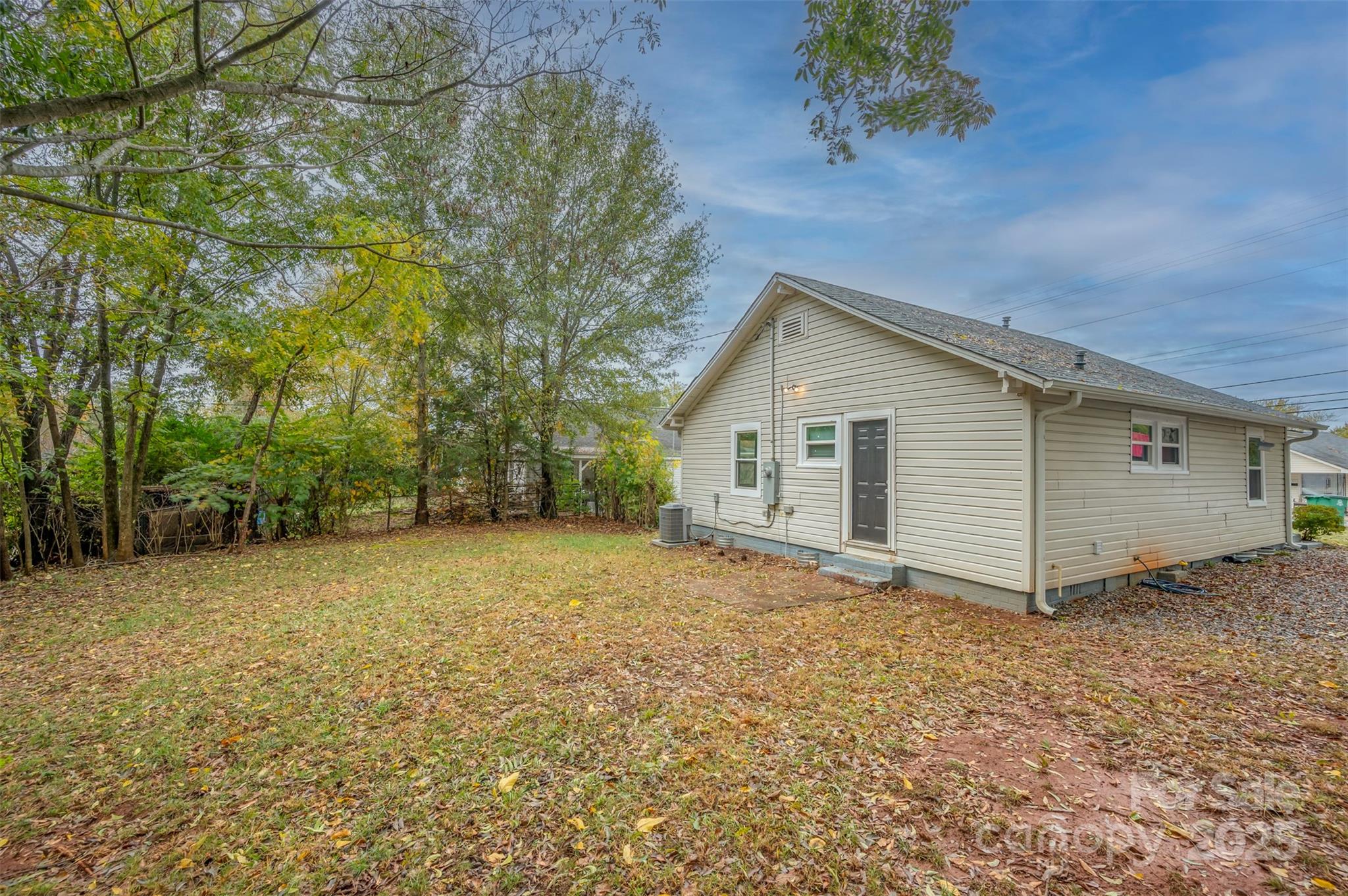 512 Spindale Street Spindale, NC 28160 - Photo 21 of 25 a view of a house with a yard