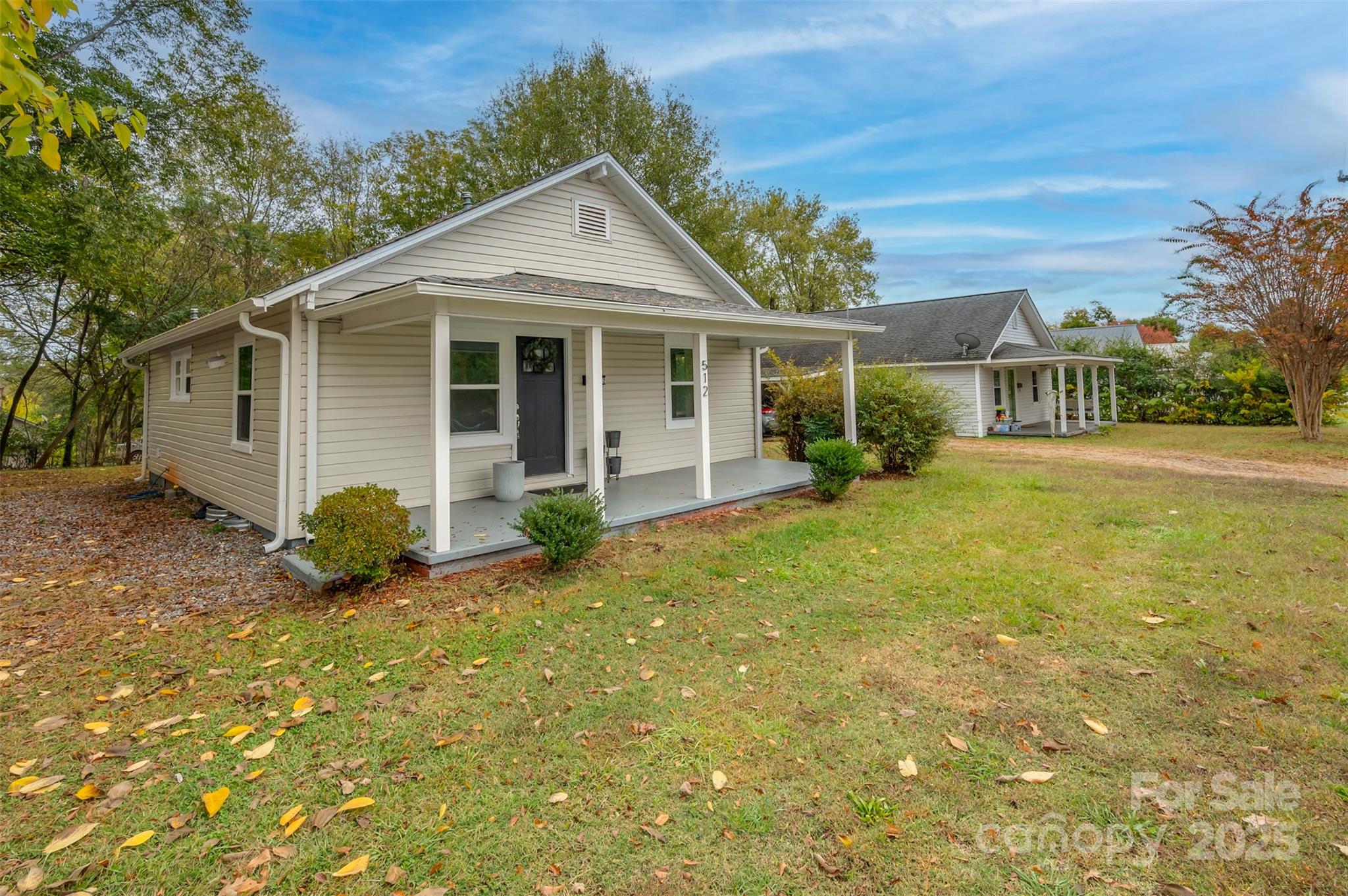 512 Spindale Street Spindale, NC 28160 - Photo 22 of 25 a view of a house with a yard