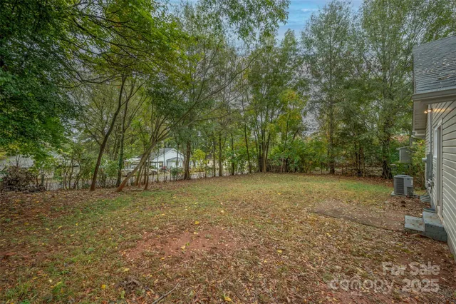 a fire hydrant in the middle of a field