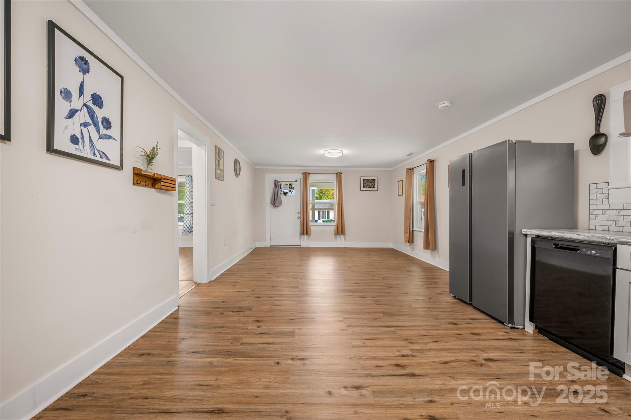 512 Spindale Street Spindale, NC 28160 - Photo 5 of 25 a view of an empty room with window and refrigerator