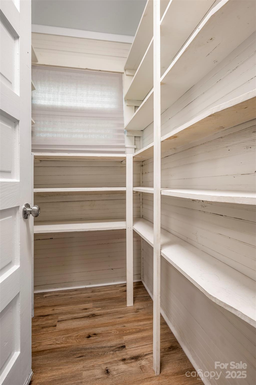 512 Spindale Street Spindale, NC 28160 - Photo 10 of 25 a view of walk in closet with empty racks