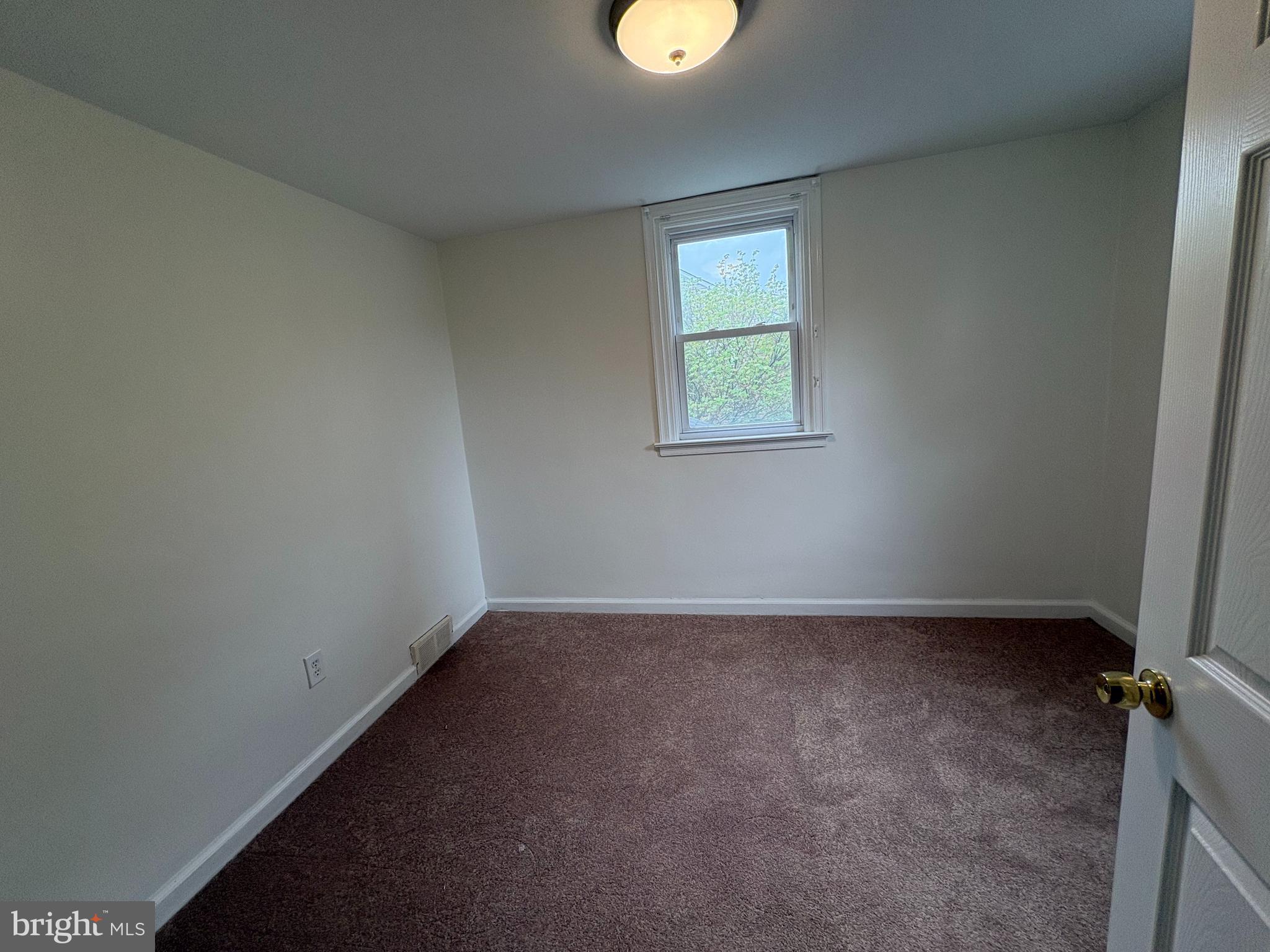 2515 Woodleigh Road Havertown, PA 19083 - Photo 11 of 31 an empty room with a window