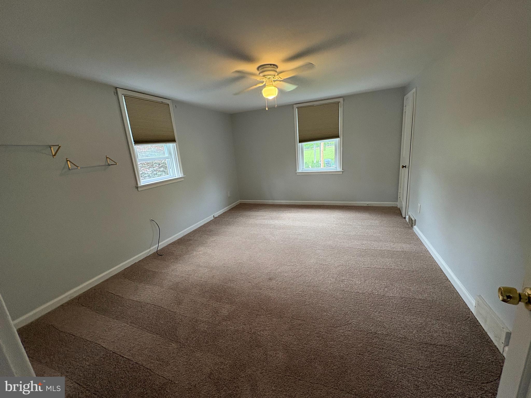 2515 Woodleigh Road Havertown, PA 19083 - Photo 12 of 31 a view of an empty room with a window
