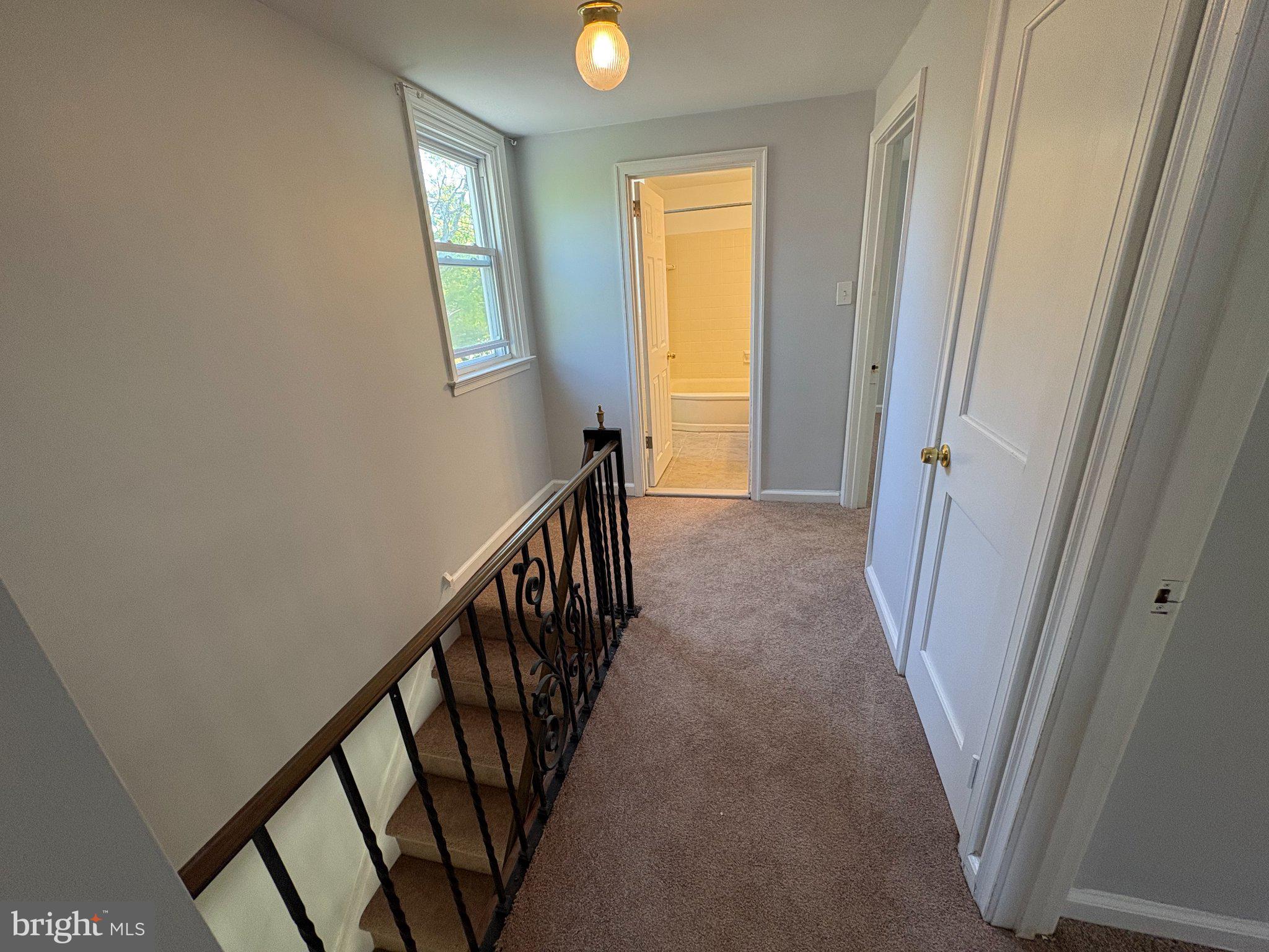 2515 Woodleigh Road Havertown, PA 19083 - Photo 15 of 31 a view of a hallway with windows