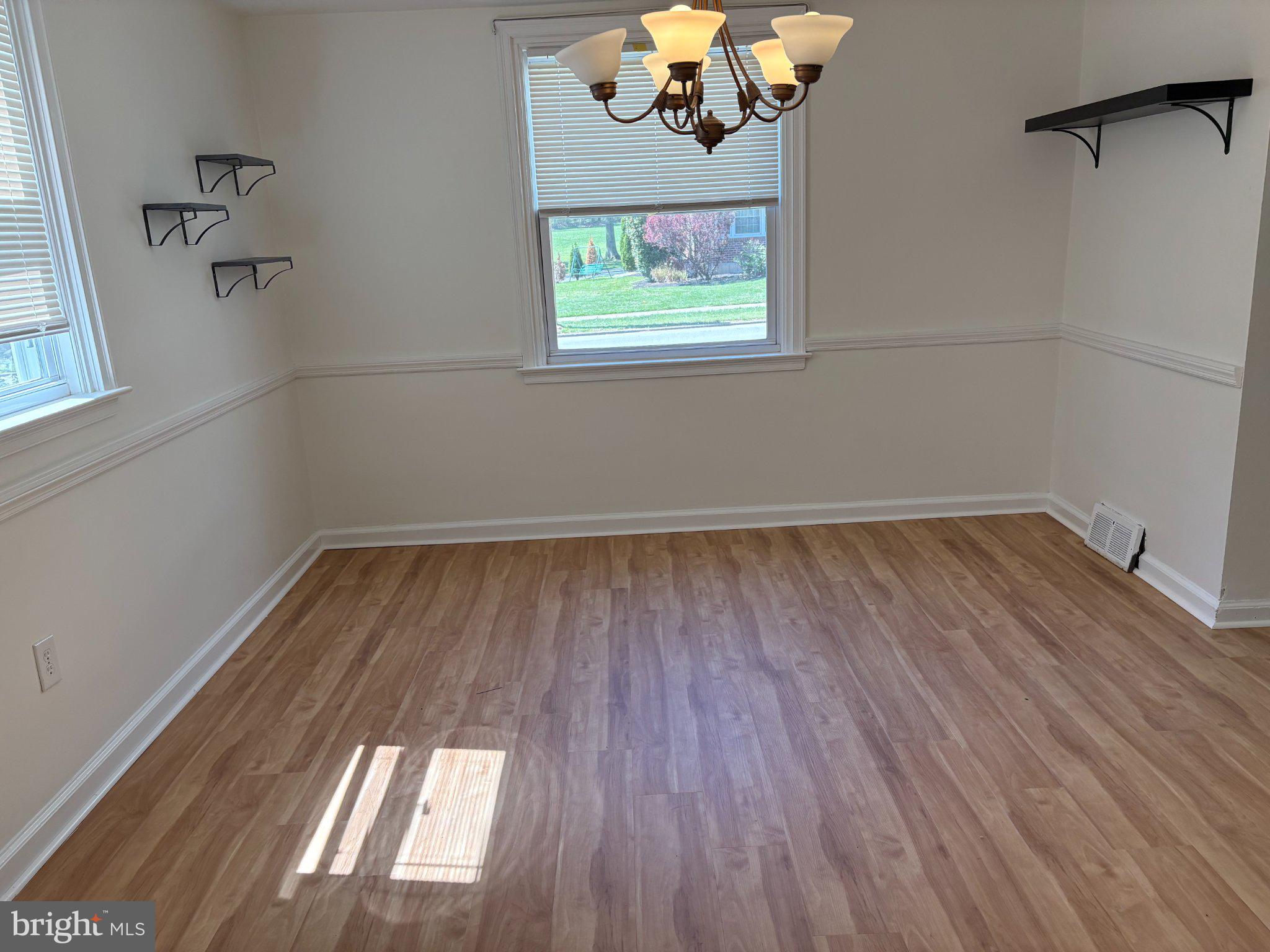 2515 Woodleigh Road Havertown, PA 19083 - Photo 17 of 31 wooden floor in an empty room with a window