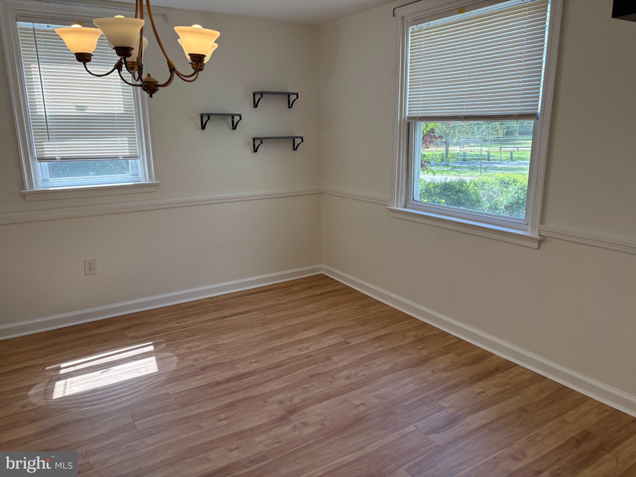 2515 Woodleigh Road Havertown, PA 19083 - Photo 22 of 31 a view of empty room with wooden floor and fan