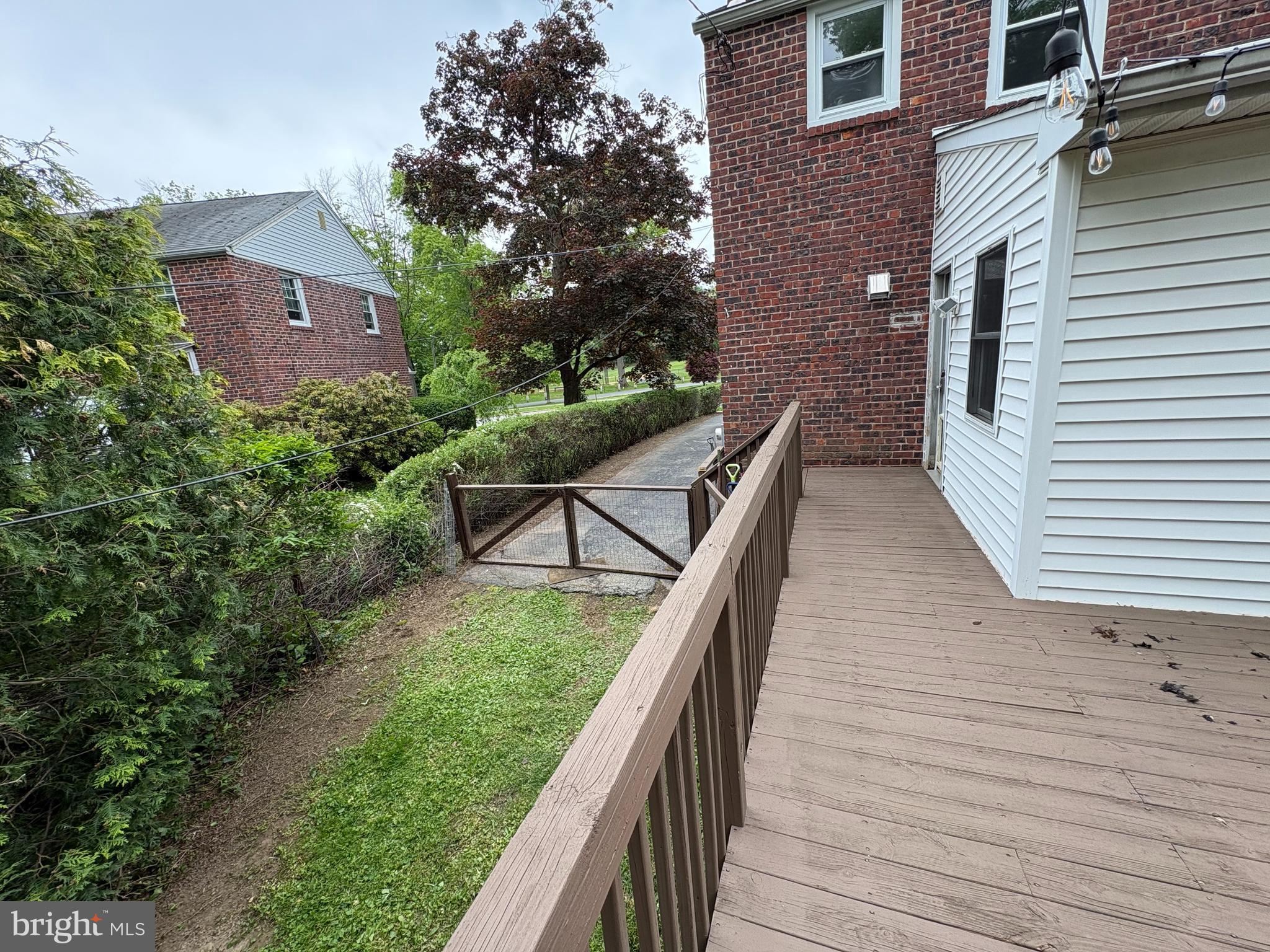2515 Woodleigh Road Havertown, PA 19083 - Photo 27 of 31 a balcony with trees in front of it