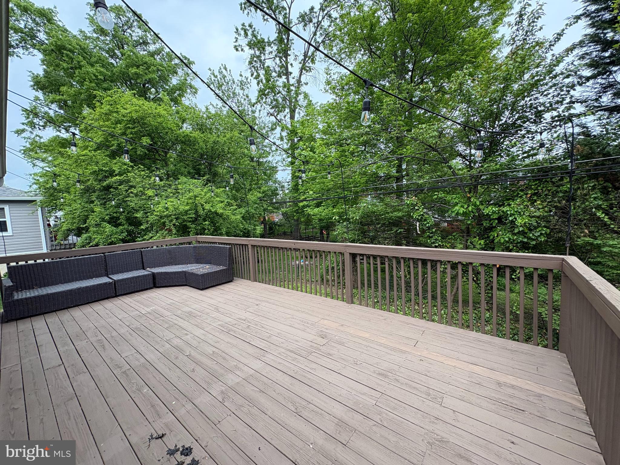 2515 Woodleigh Road Havertown, PA 19083 - Photo 30 of 31 a balcony with wooden floor and trees