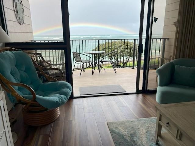 4471 Lower Honoapiilani Road, Unit 202 Lahaina, HI 96761 - Photo 23 of 24 a living room with furniture and a large window
