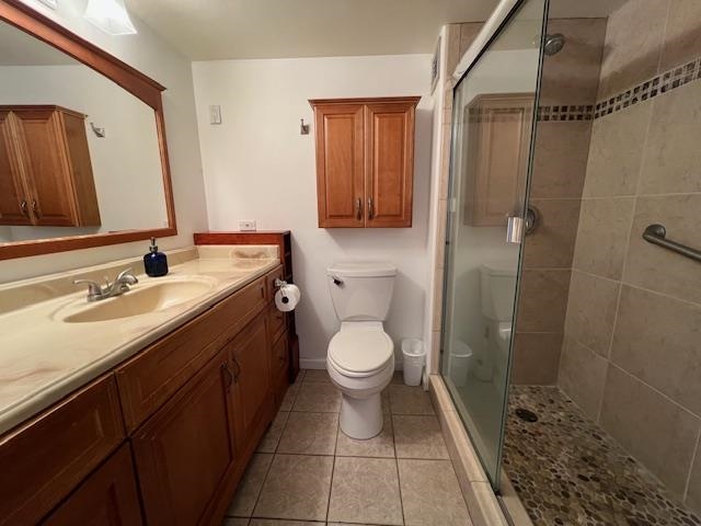 4471 Lower Honoapiilani Road, Unit 202 Lahaina, HI 96761 - Photo 7 of 24 a bathroom with a granite countertop sink toilet and shower