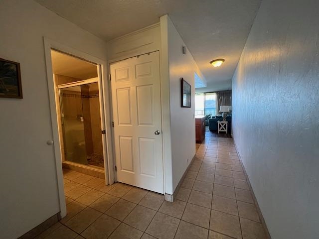 4471 Lower Honoapiilani Road, Unit 202 Lahaina, HI 96761 - Photo 8 of 24 a view of a hallway with a furniture