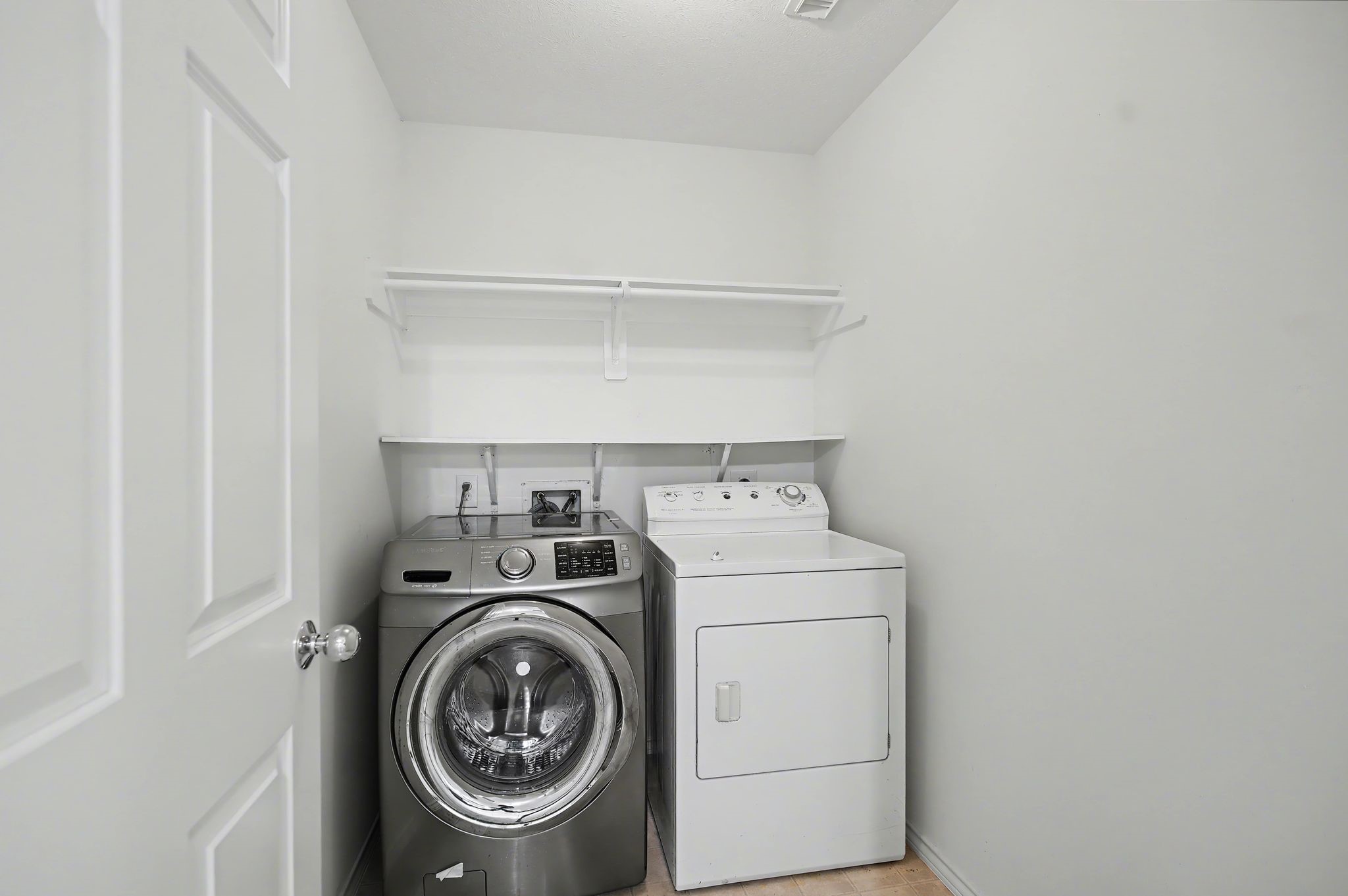 2416 Charleston Street, Unit A Houston, TX 77021 - Photo 21 of 24 a utility room with dryer and washer