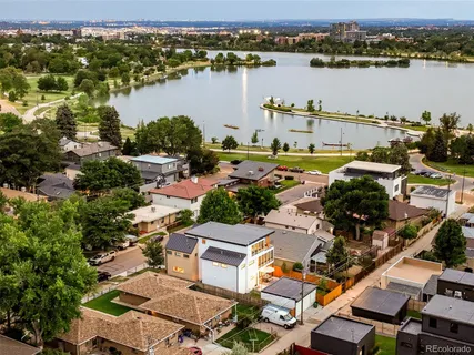 an aerial view of a house with a lake view