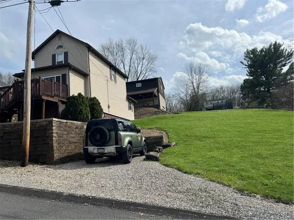 a car parked in front of a house