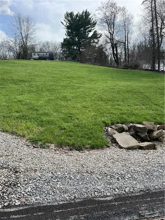 a view of a garden and basketball court