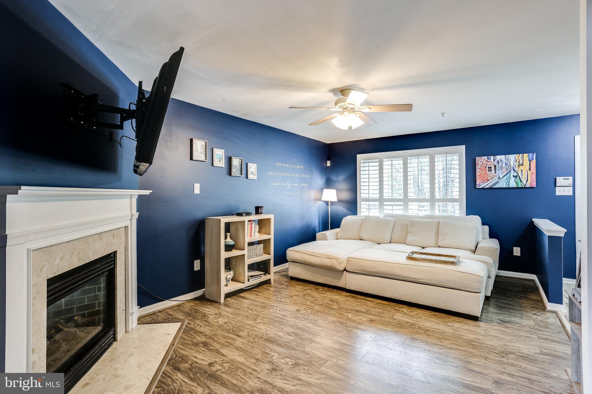 751 Shallow Ridge Court Abingdon, MD 21009 - Photo 5 of 33 Living Room w/ Gas Fireplace & Ceiling Fan