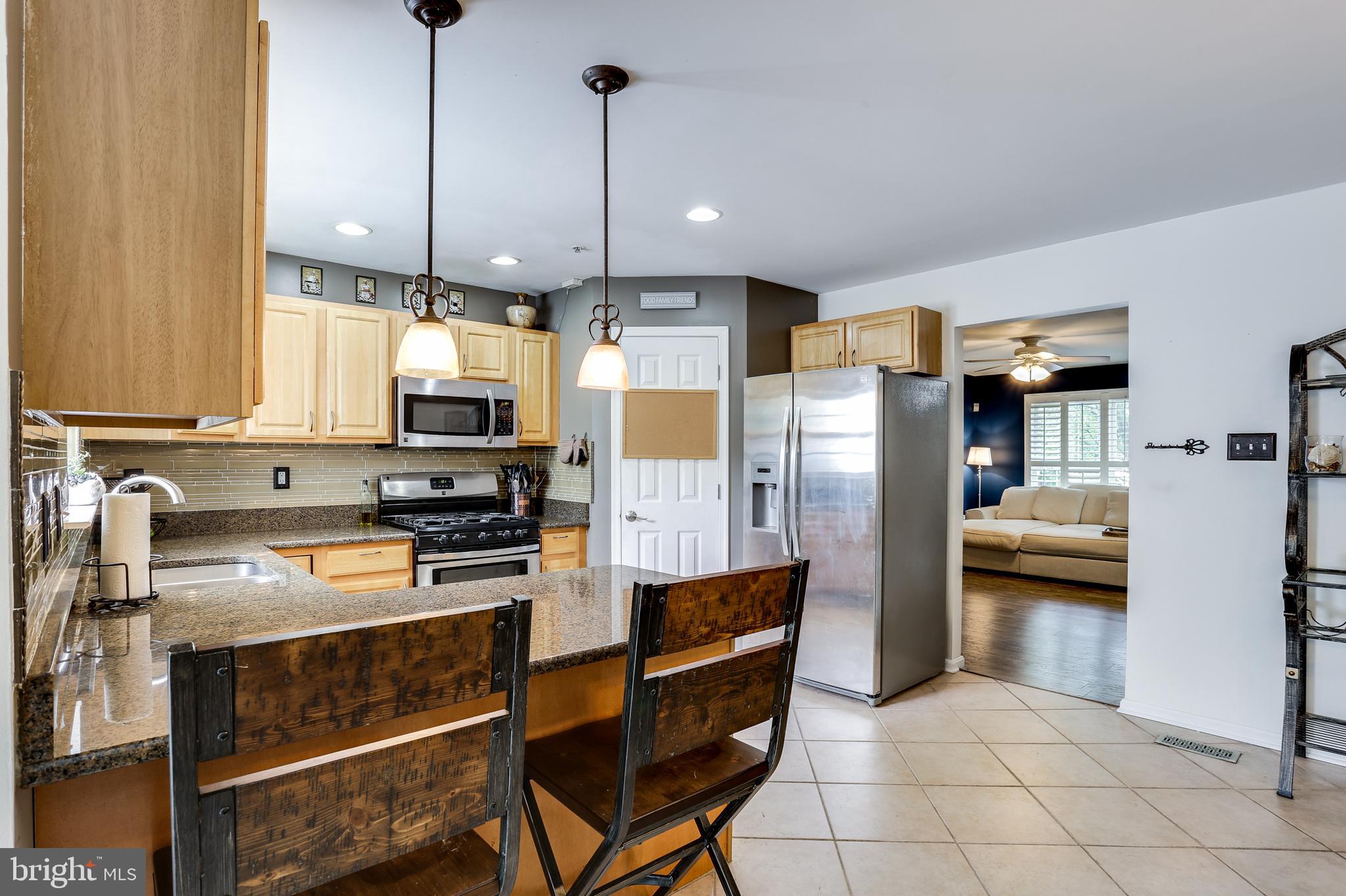 751 Shallow Ridge Court Abingdon, MD 21009 - Photo 10 of 33 Gourmet Kitchen w/ Breakfast Bar & Pendant Ltng