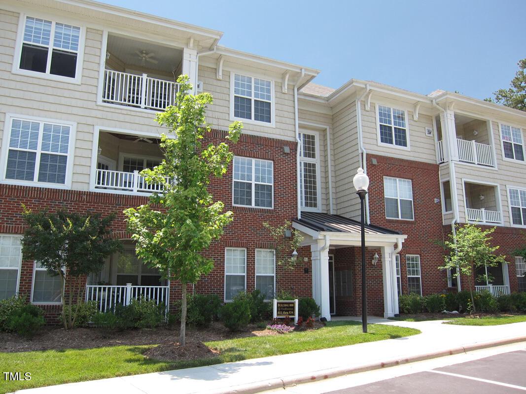 831 Providence Glen Drive Chapel Hill, NC 27514 - Photo 1 of 14 a front view of a multi story residential apartment building