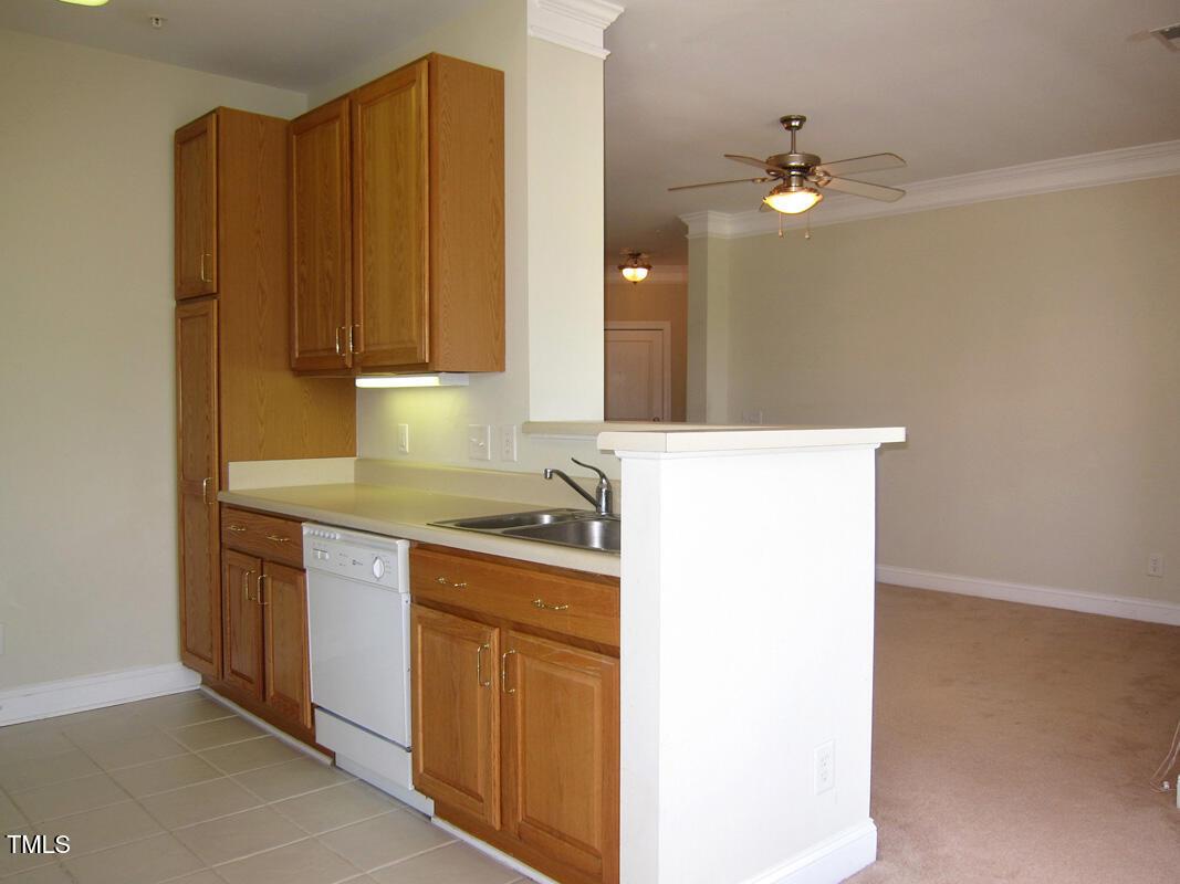 831 Providence Glen Drive Chapel Hill, NC 27514 - Photo 6 of 14 a room with a sink and cabinets
