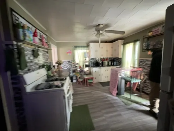 a view of a living room and dining room