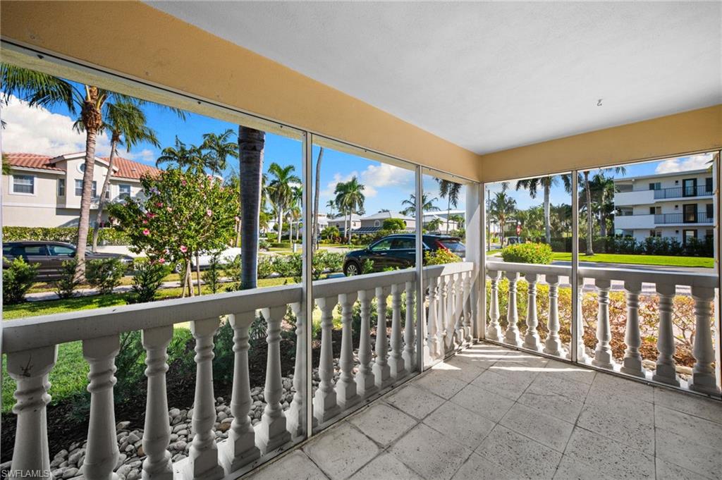 666 3rd Street South, Unit 106 Naples, FL 34102 - Photo 13 of 32 a view of a building from a balcony