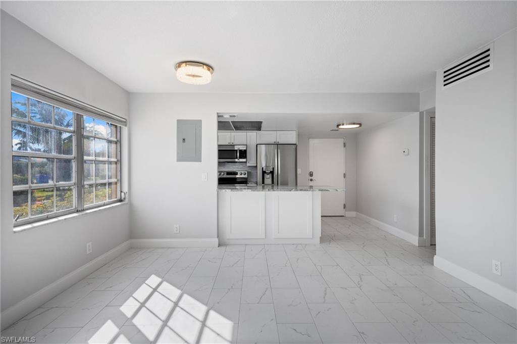 666 3rd Street South, Unit 106 Naples, FL 34102 - Photo 15 of 32 a view of kitchen and window
