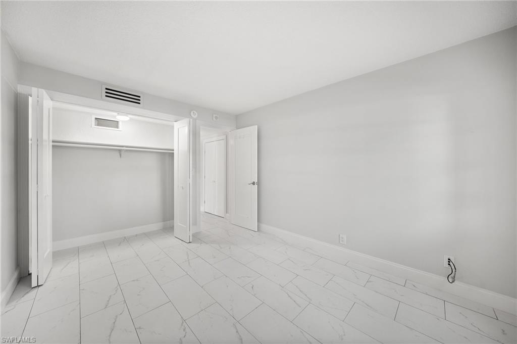 666 3rd Street South, Unit 106 Naples, FL 34102 - Photo 16 of 32 a view of an empty room