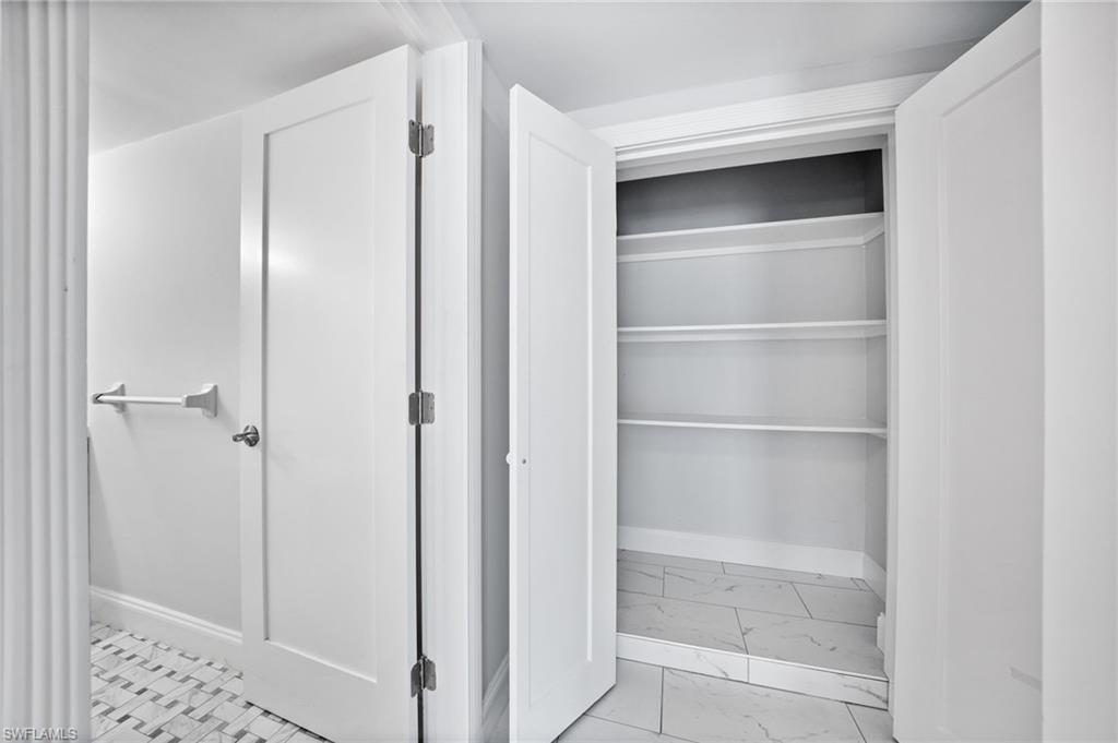 666 3rd Street South, Unit 106 Naples, FL 34102 - Photo 21 of 32 a view of a walk in closet