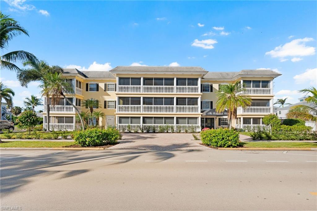 666 3rd Street South, Unit 106 Naples, FL 34102 - Photo 23 of 32 a front view of a building with a street view