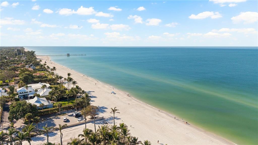666 3rd Street South, Unit 106 Naples, FL 34102 - Photo 31 of 32 a view of a lake with a city