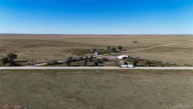 an ocean beach with an outdoor seating