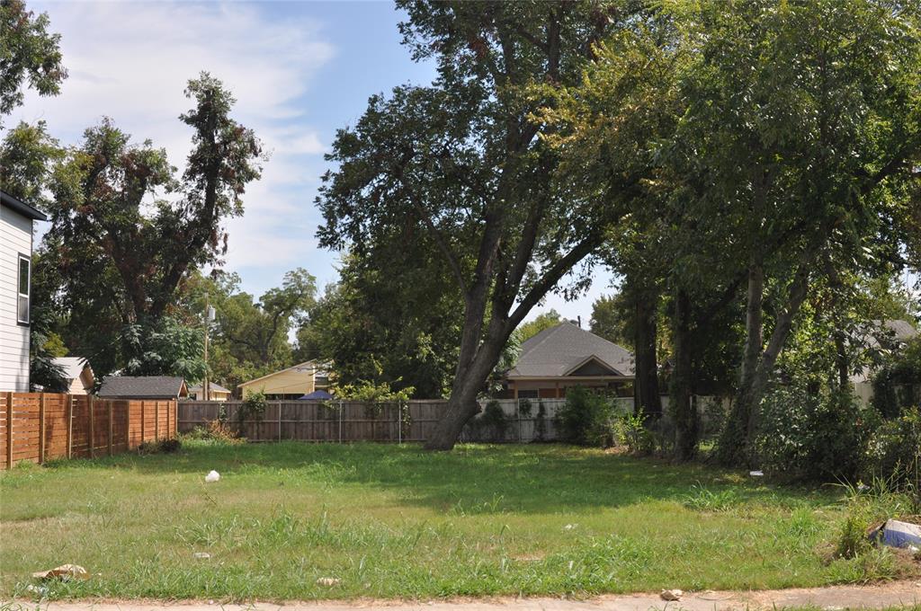 3520 Carl Street Dallas, TX 75210 - Photo 5 of 13 a view of a house with a yard