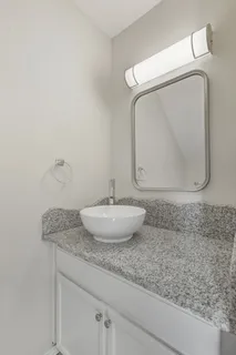 a kitchen with a stove and a sink
