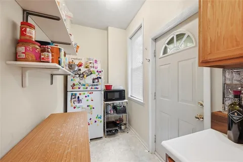 a view of a storage & utility room with stuff