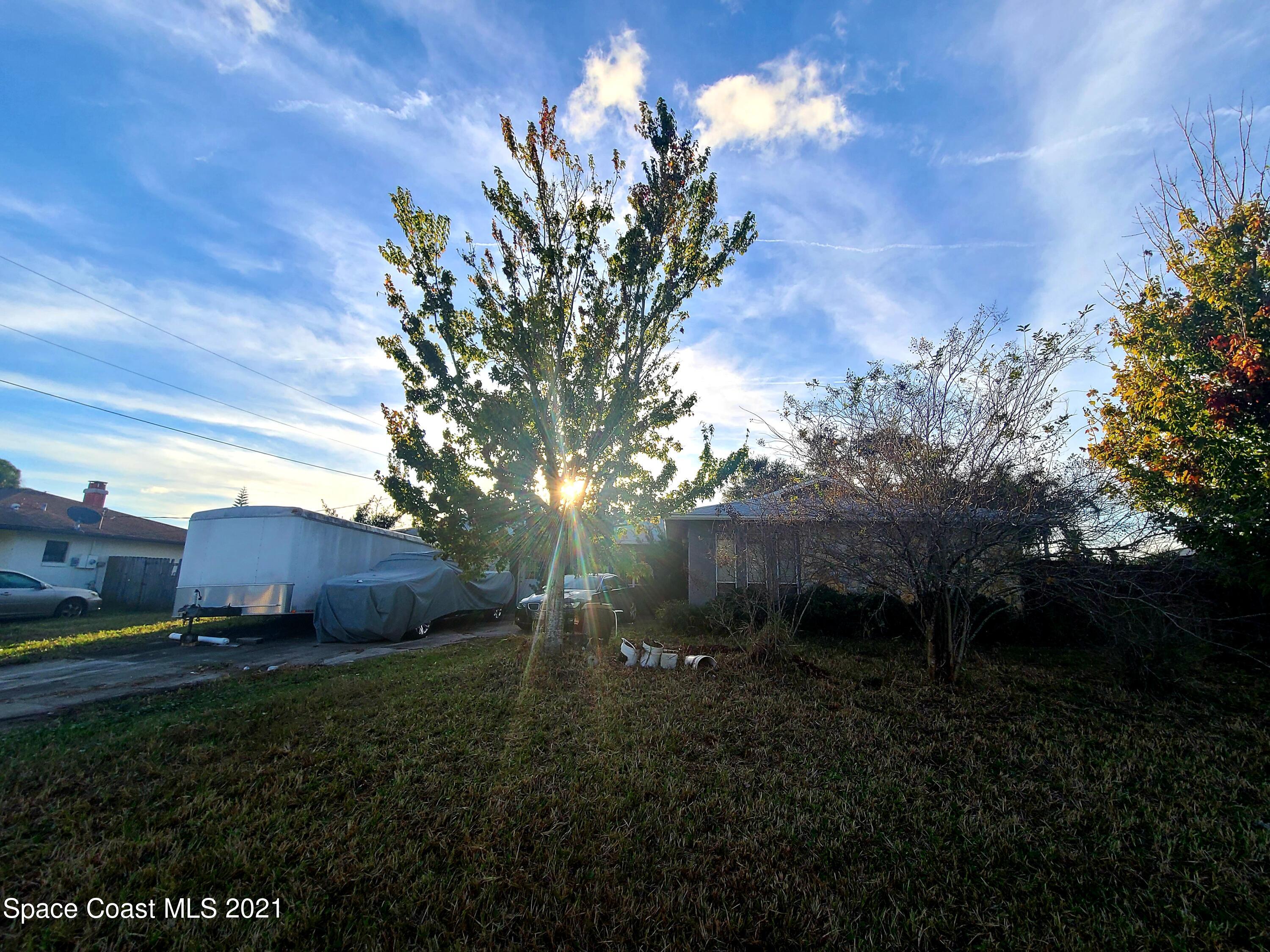 292 Chase Road Cocoa, FL 32927 - Photo 1 of 17 a view of a backyard of the house