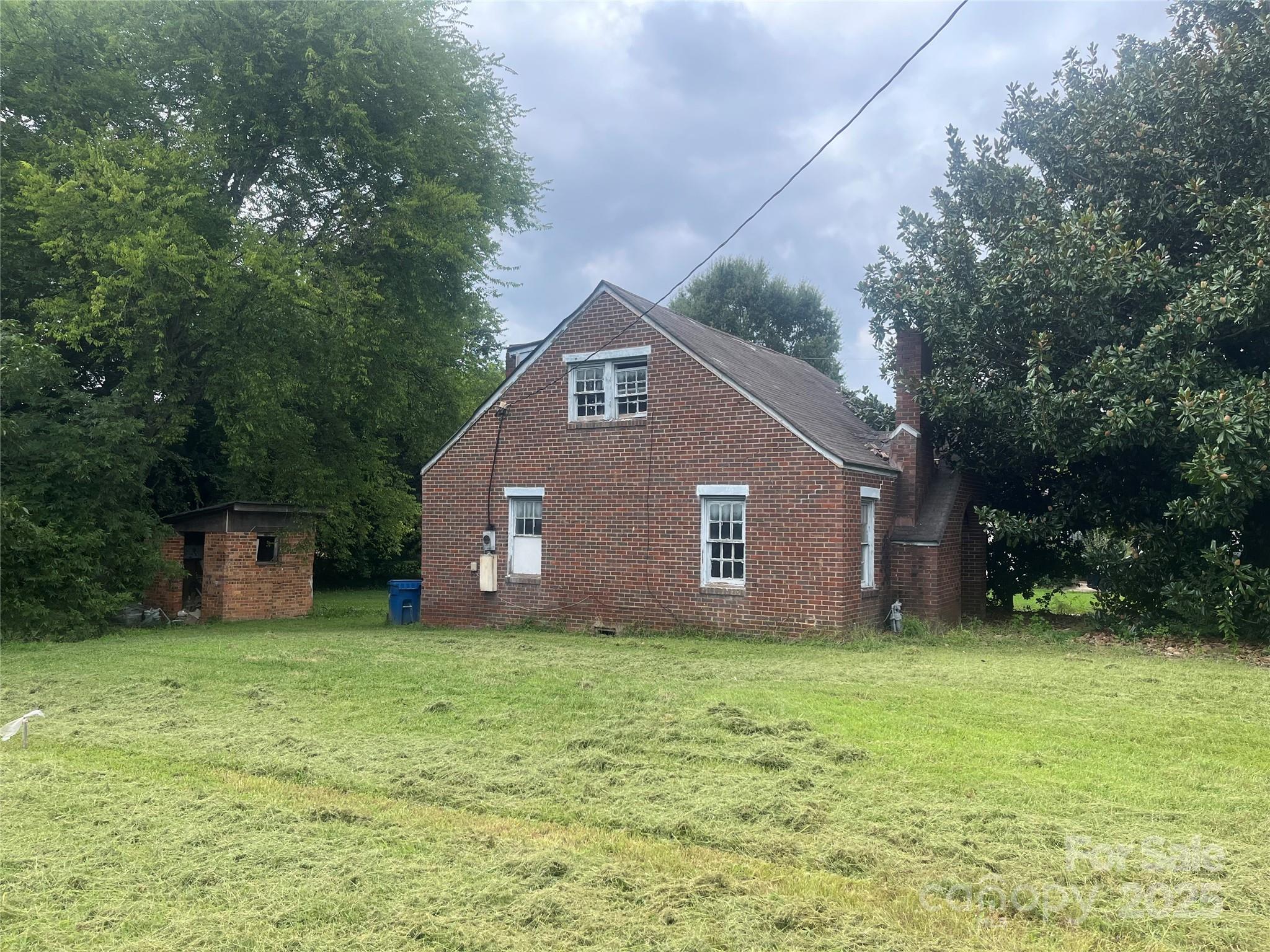 218 South Main Street Wingate, NC 28174 - Photo 2 of 5 a house view with a outdoor space