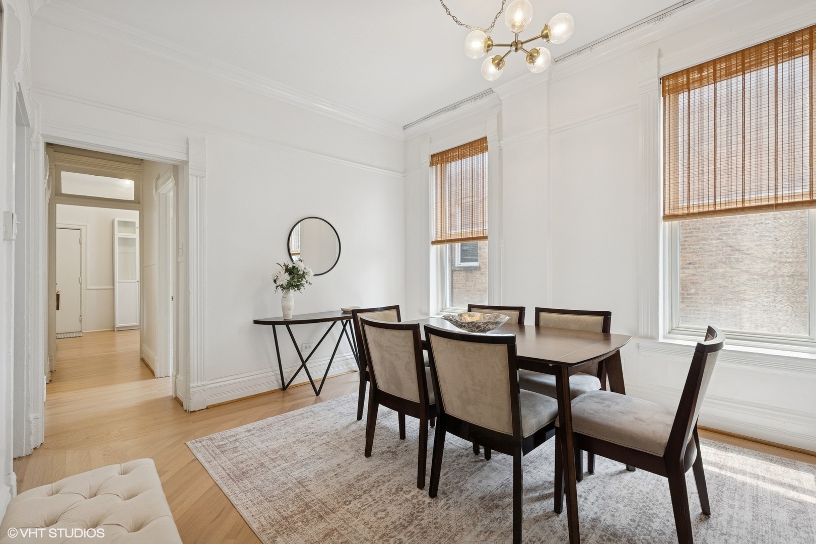 1411 North Wells Street, Unit 3W Chicago, IL 60610 - Photo 16 of 32 a dining room with furniture and window