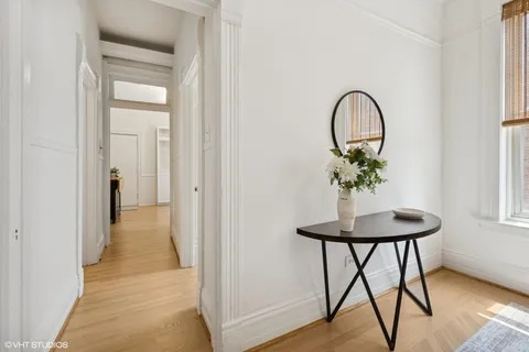 a view of a livingroom with furniture and wooden floor