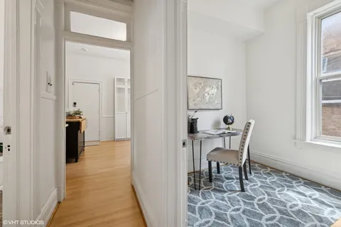 a view of a dining room with furniture