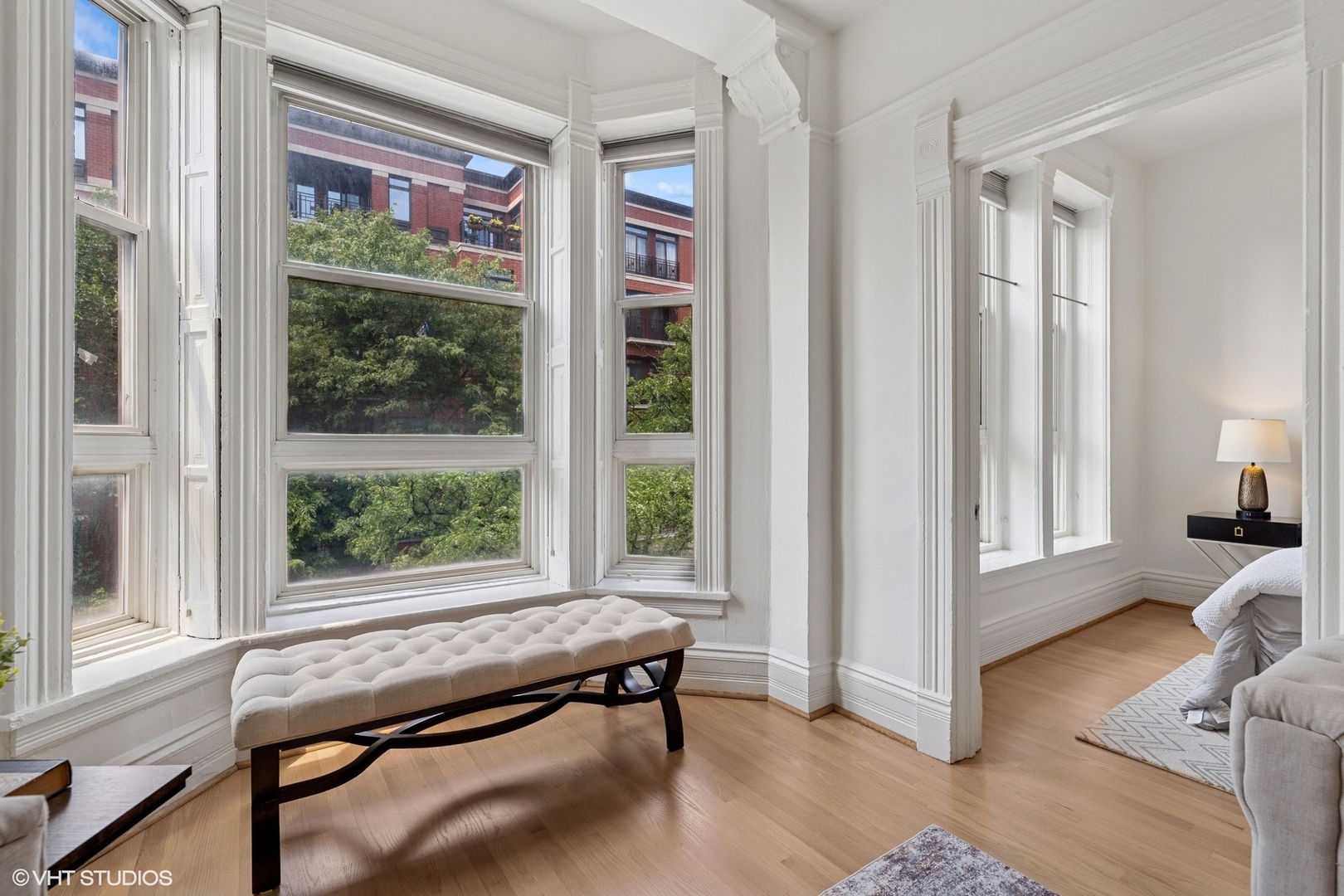 1411 North Wells Street, Unit 3W Chicago, IL 60610 - Photo 10 of 32 a room with furniture and a window