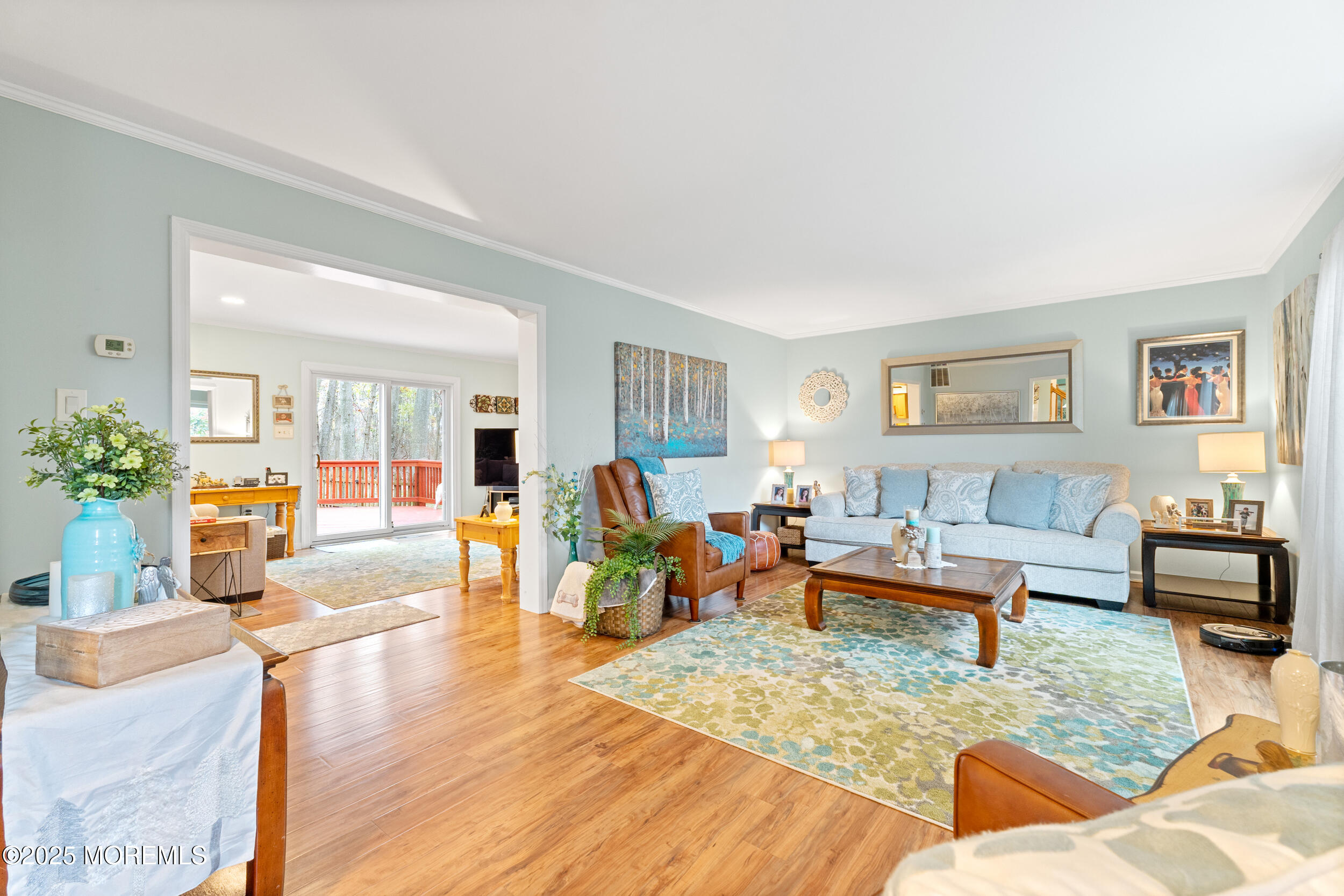 1418 Forest Avenue Brick, NJ 08724 - Photo 11 of 47 a living room with furniture and wooden floor