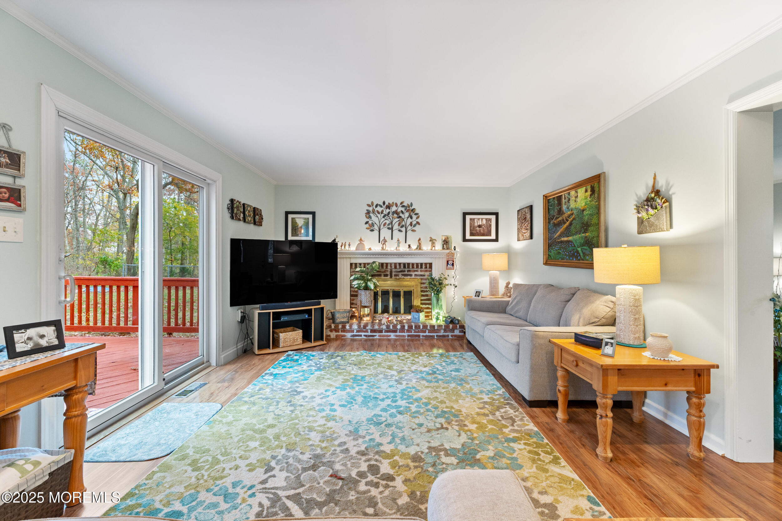 1418 Forest Avenue Brick, NJ 08724 - Photo 13 of 47 a living room with furniture and a flat screen tv