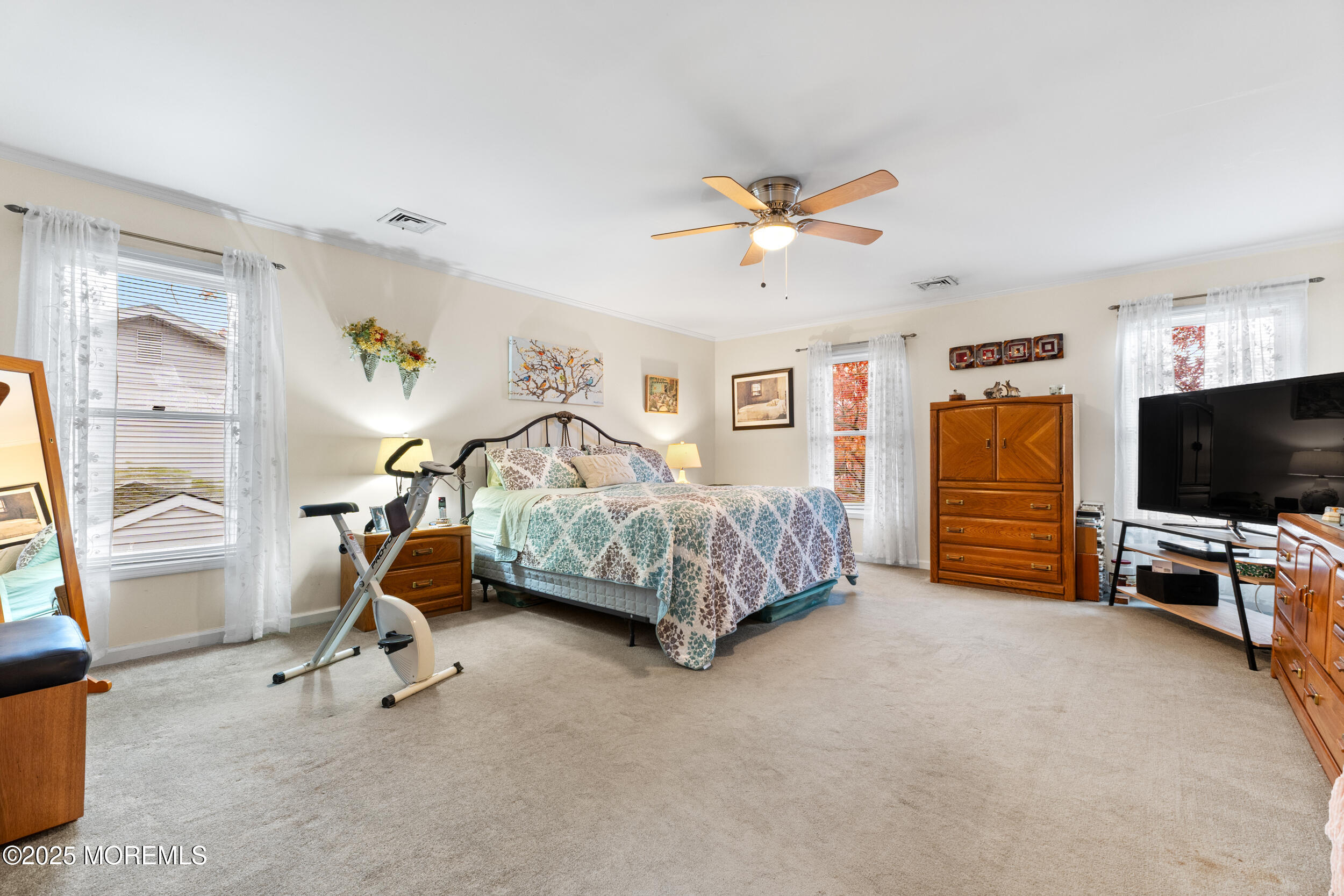1418 Forest Avenue Brick, NJ 08724 - Photo 23 of 47 a bedroom with furniture and a flat screen tv