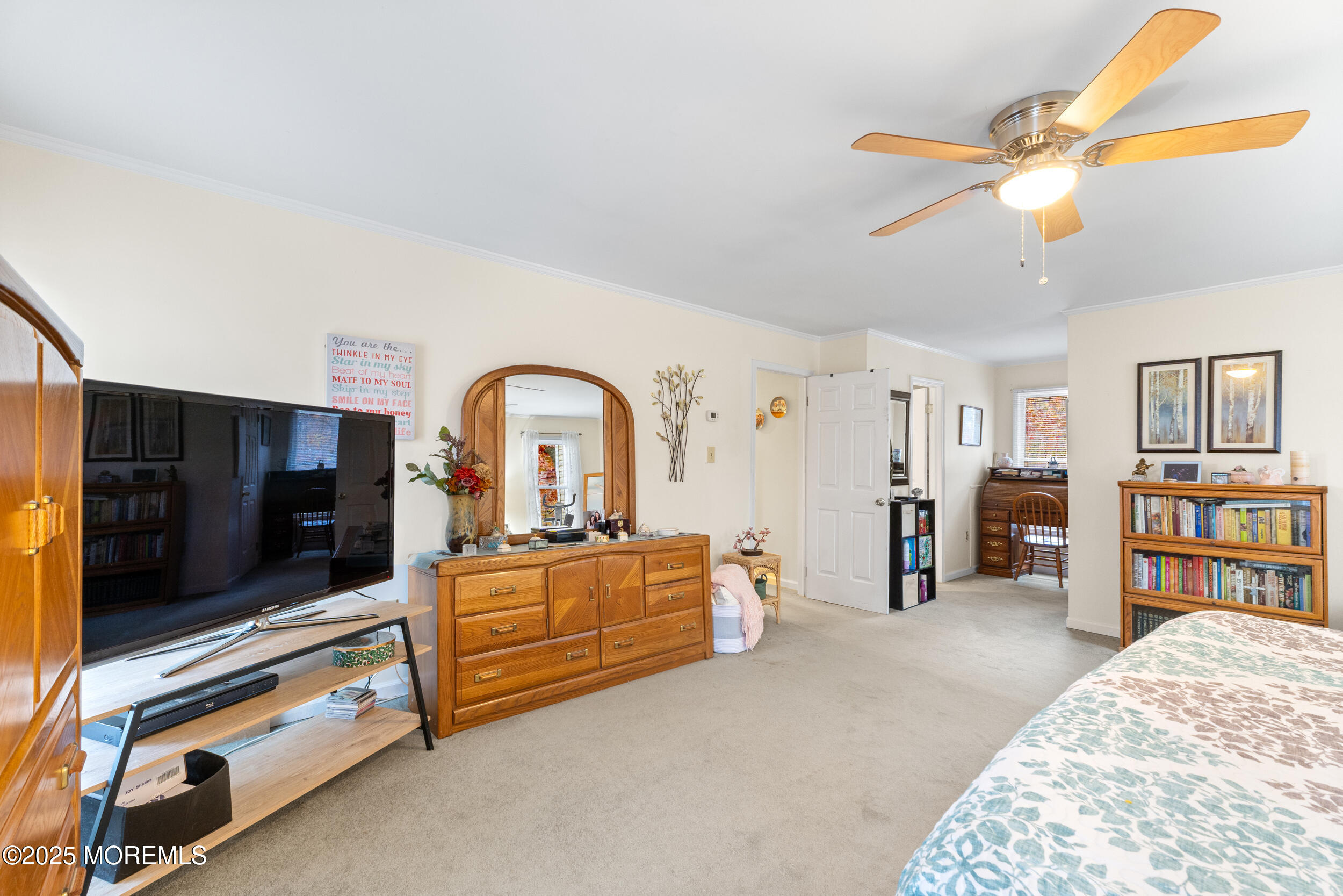 1418 Forest Avenue Brick, NJ 08724 - Photo 24 of 47 a living room with furniture gym equipment and a flat screen tv