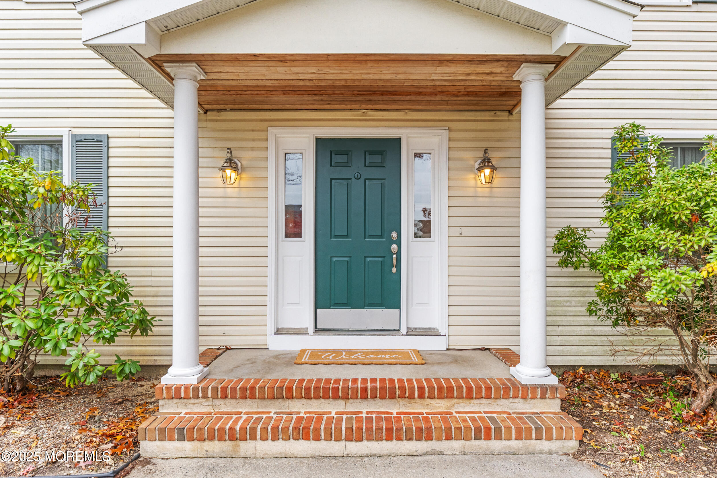 1418 Forest Avenue Brick, NJ 08724 - Photo 3 of 47 a front view of a house with a garden