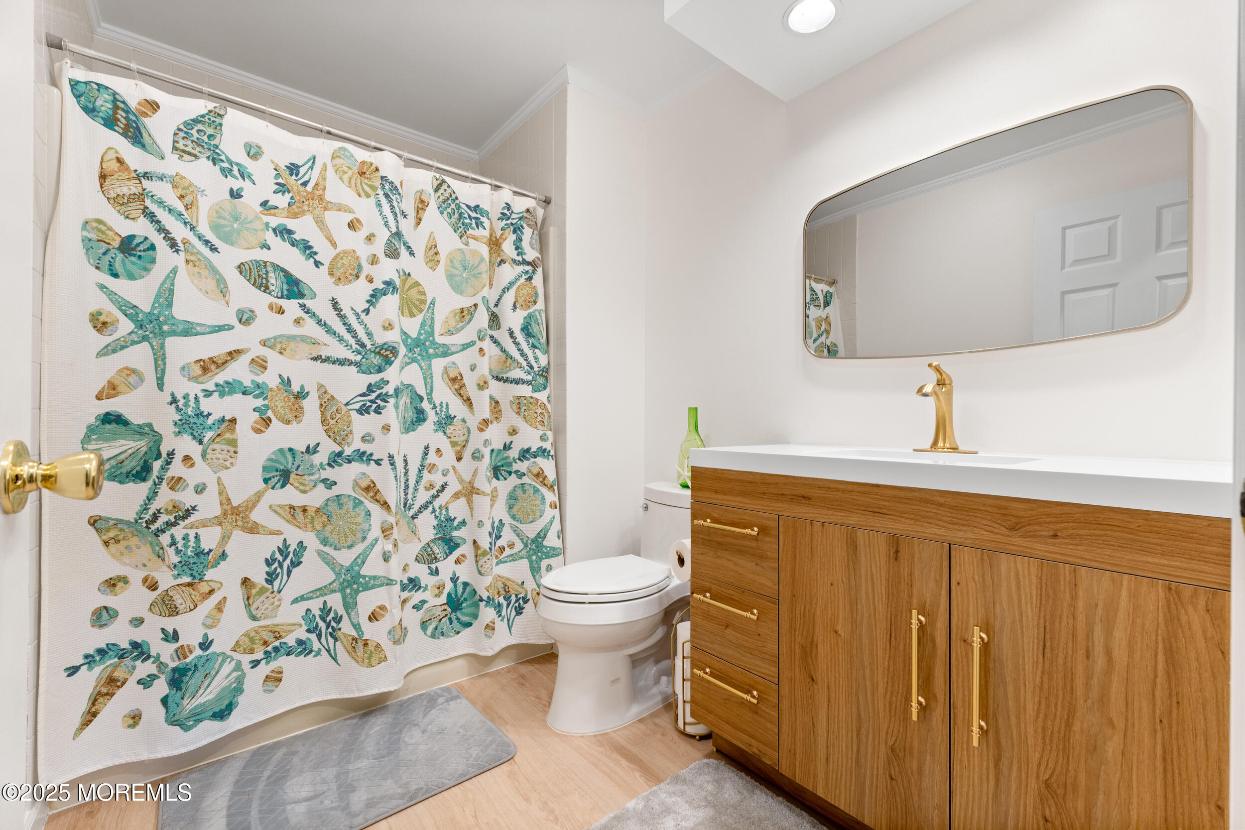 1418 Forest Avenue Brick, NJ 08724 - Photo 36 of 47 a bathroom with a toilet and a sink