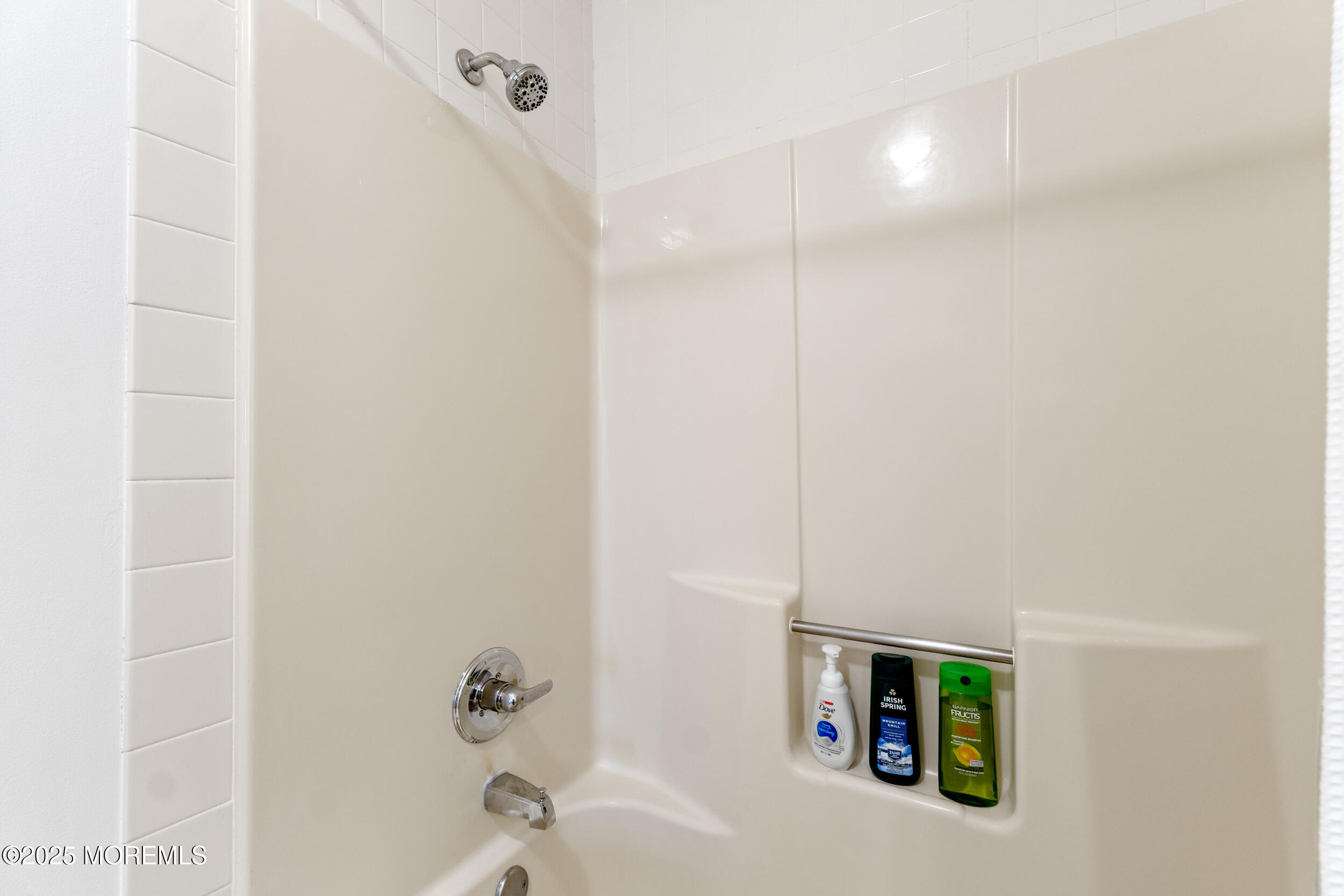 1418 Forest Avenue Brick, NJ 08724 - Photo 38 of 47 a bathroom with a bathtub and a shower