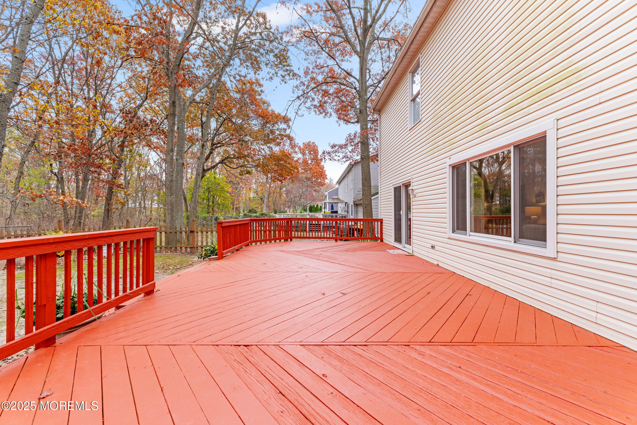 1418 Forest Avenue Brick, NJ 08724 - Photo 41 of 47 a view of backyard with deck and wooden floor
